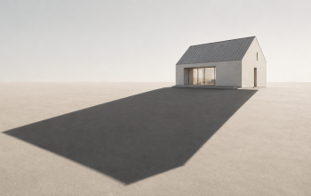Ein graues Haus wirkt seinen Schatten